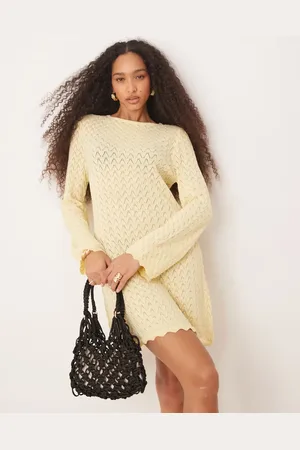 ASOS Knitted mini dress with flared sleeve in buttermilk