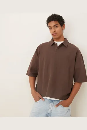 ASOS Oversized boxy polo with elasticated hem in
