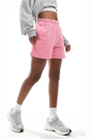 The Couture Club Washed emblem shorts in