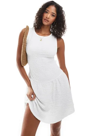 Miss Selfridge Textured jersey lace trim tie back flippy dress in cream