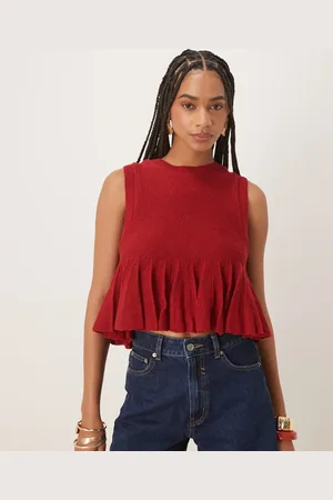 ASOS Knitted tank top with peplum frill hem in