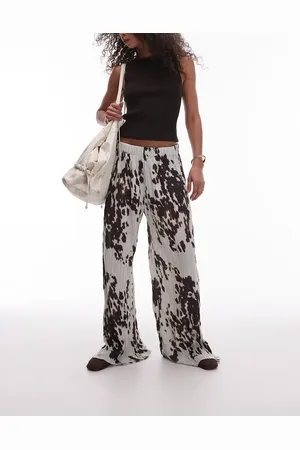 Topshop Crinkle wide leg trousers in cow print