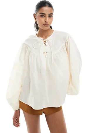 ASOS Smock top with lace up neck detail in stone