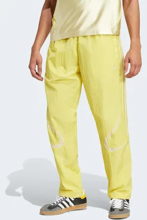 adidas Adicolor 2000s woven track pants in pure sulfur / powder