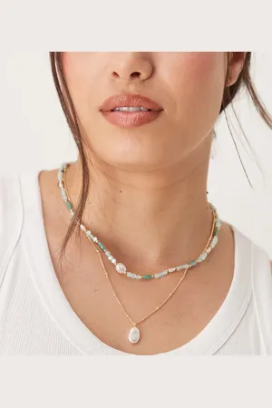 ASOS ASOS DESIGN Curve multi-row necklace with beads and faux pearl pendants in and gold tone