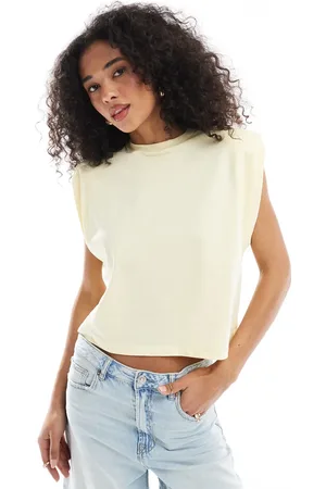 ASOS Sleeveless shoulder pad top in buttermilk