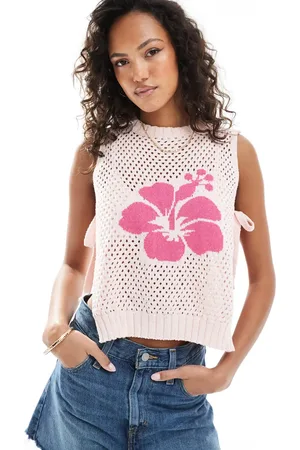 ASOS Crew neck knit tabard vest with hibiscus flower in