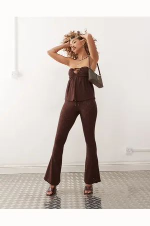 Motel Dan low-rise broderie flares in