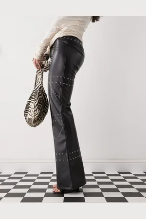 The Kript Low rise leather trousers with studs in