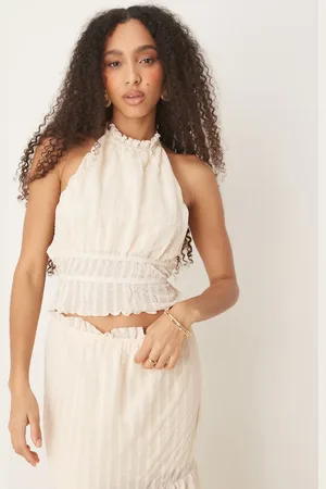 ASOS Co-ord textured sleeveless halter neck top with open back in cream