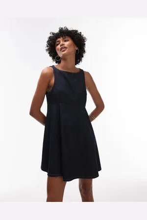 Topshop Denim slash neck flippy mini dress in rinse wash