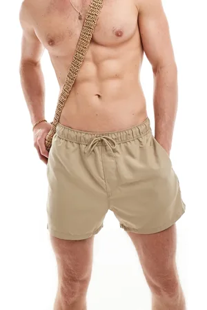 ASOS Swim shorts in short length in stone