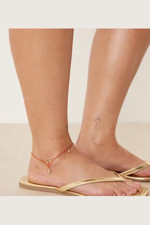 ASOS ASOS DESIGN Curve multi row anklet with starfish in orange and tone