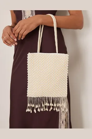 True Decadence Pearl beaded bag with tassle in