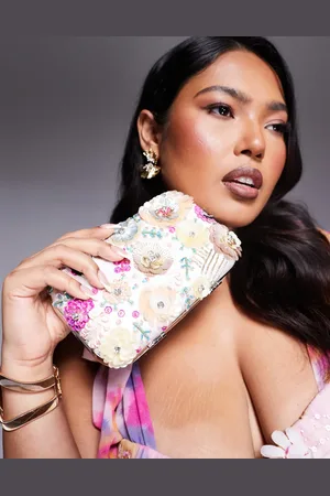 True Decadence Flower embellished hard clutch bag in