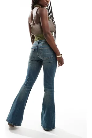 Monki Katsumi low waist boot cut flare jeans in dark wash