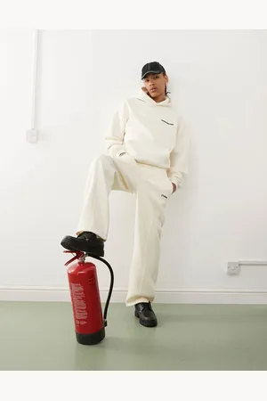 Prohibited Script logo straight leg jogger in ecru