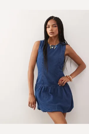 Reclaimed Sleeveless denim puffball mini dress in indigo