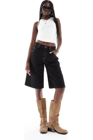 Bershka Contrast stitch longline baggy shorts in black