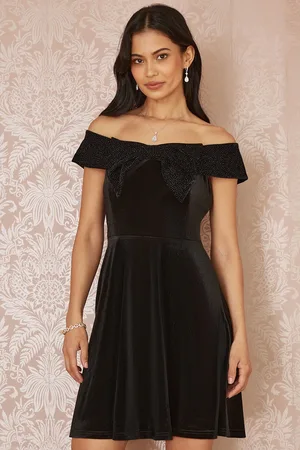 Mela Velvet Skater Dress With Sparkle Bow Neckline