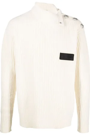 Button-embossed knitted jumper