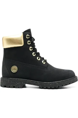 Black and gold champion timbs clearance