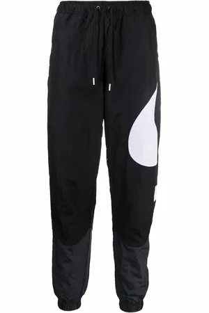 Nike Swoosh-print track pants
