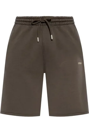 OFF-WHITE Arrow-print cotton track shorts