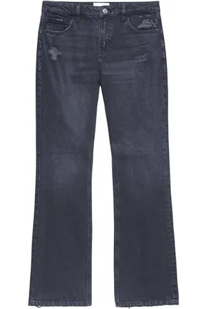 Frame The Low Boot distressed jeans