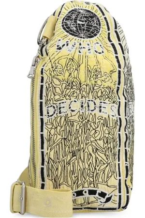 Who Decides War Bullet cross body bag