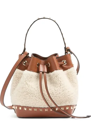 VALENTINO GARAVANI Rockstud shearling bucket bag
