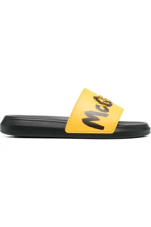 Alexander McQueen Graffiti-logo slip-on slides
