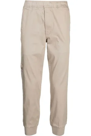 A Bathing Ape Logo-print tapered trousers