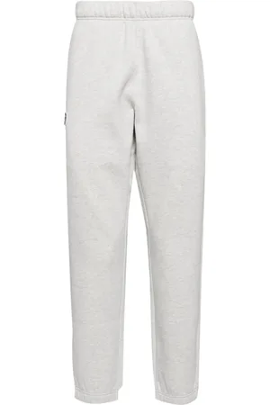 A Bathing Ape Moonface logo track pants