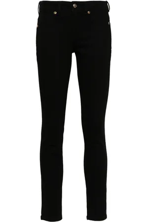 VERSACE Logo-plaque skinny jeans