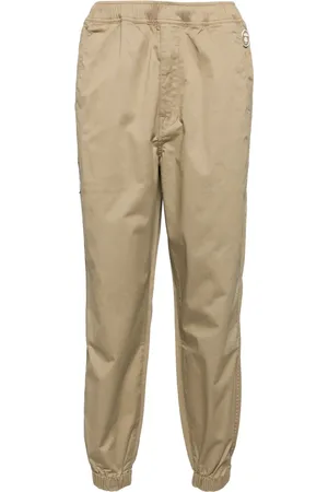 A Bathing Ape Moonface logo pants
