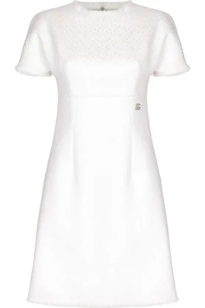 Dolce & Gabbana Appliqué-logo bouclé mini dress