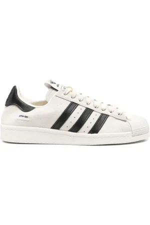 SONG FOR THE MUTE X Adidas Superstar trainers