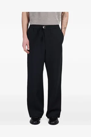 Ami Logo-buckled trousers