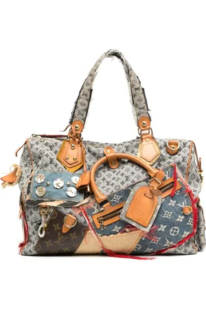 LOUIS VUITTON Denim patchwork cabby bag