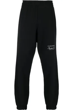 MARTINE ROSE Logo-print track pants