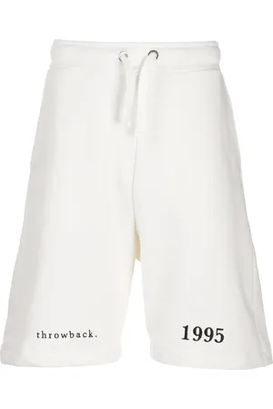 Throwback. Logo embroidered track shorts