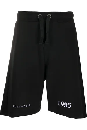 Throwback. Logo embroidered track shorts