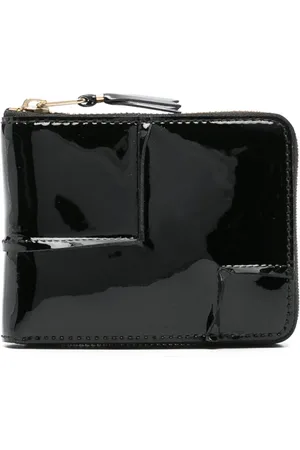 Comme des Garçons Reversed Hem leather wallet