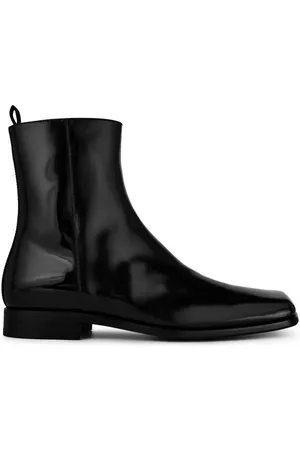 Prada Tronchetti Leather Chelsea Boots
