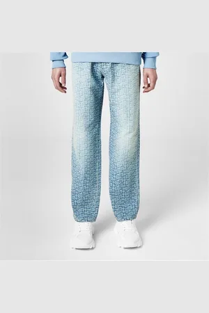 Balmain Monogrammed Jacquard Denim Jeans