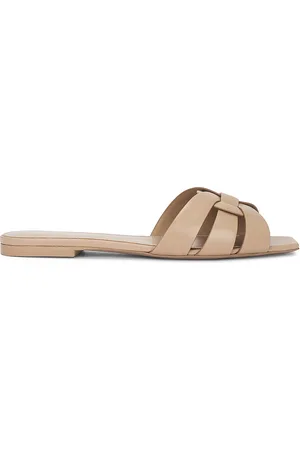Saint Laurent Tribute Flat Sandal in Dark Beige - Beige. Size 36 (also in 36.5, 37, 37.5, 38, 38.5, 39, 39.5, 40).