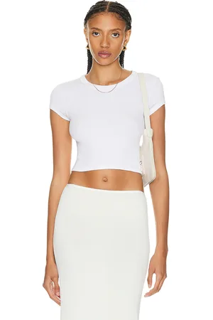 ENZA COSTA Silk Knit Cropped Cap Sleeve T-shirt in White - White. Size L (also in ).