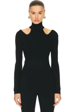 Alaïa Cut Out Bodysuit Top in Noir in Noir ALA?A - Black. Size 42 (also in ).