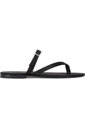 Saint Laurent Laszlo Flat Slide in Noir - Black. Size 36 (also in 36.5, 37, 37.5, 38, 38.5, 39, 39.5, 40, 41).